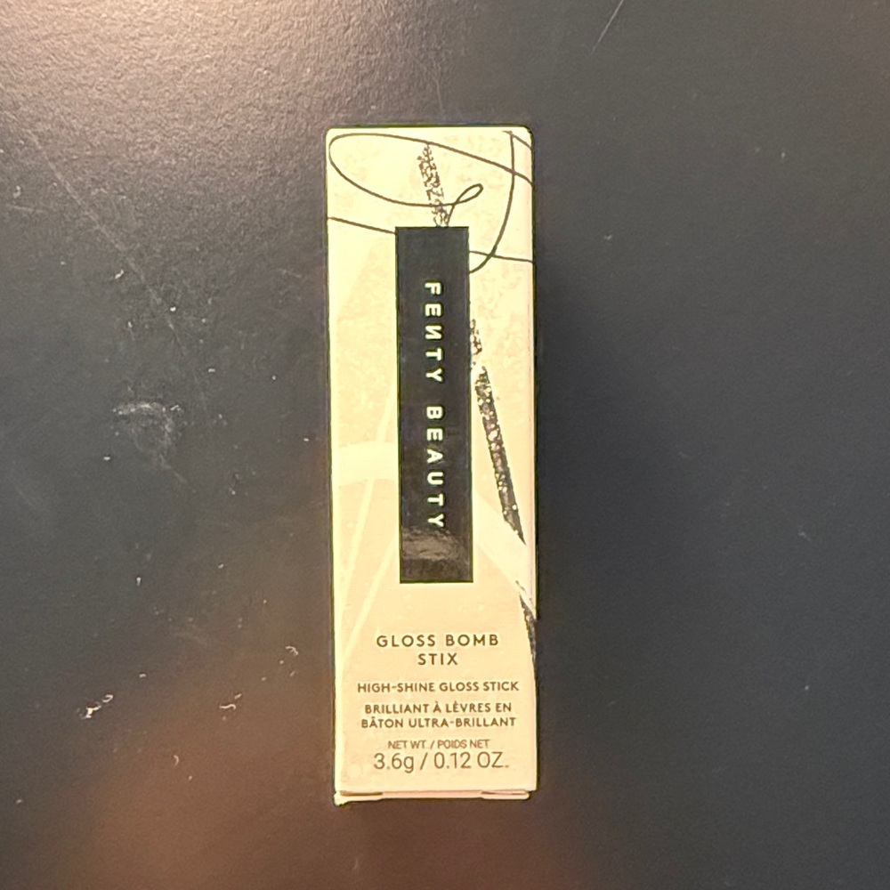 Fenty Beauty Gloss Bomb Stix in Elegant Black and Cream
